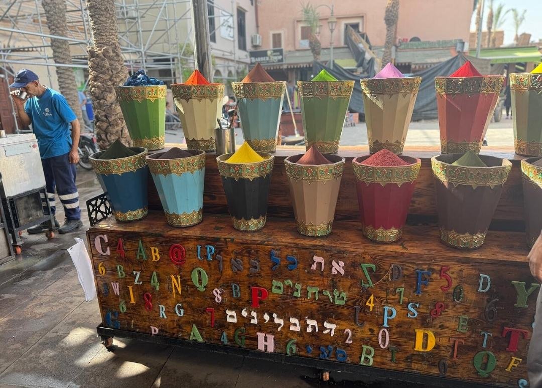 Colorful display of Moroccan spices in Marrakech Medina market