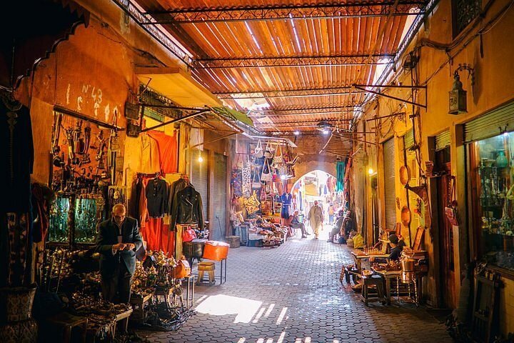 Historic Medina of Marrakech with colorful textile shops