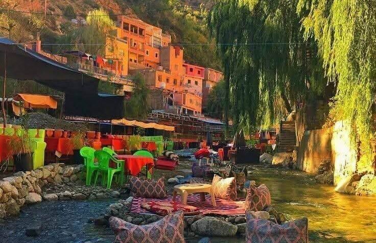 Green riverside lounge in Ourika Valley at sunset