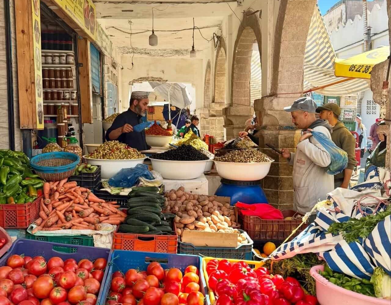 Display of assorted Moroccan olive varieties at a shop in Essaouira's medina