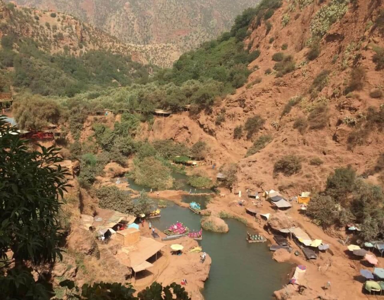 Aerial mountain valley view with a small natural lake in the High Atlas