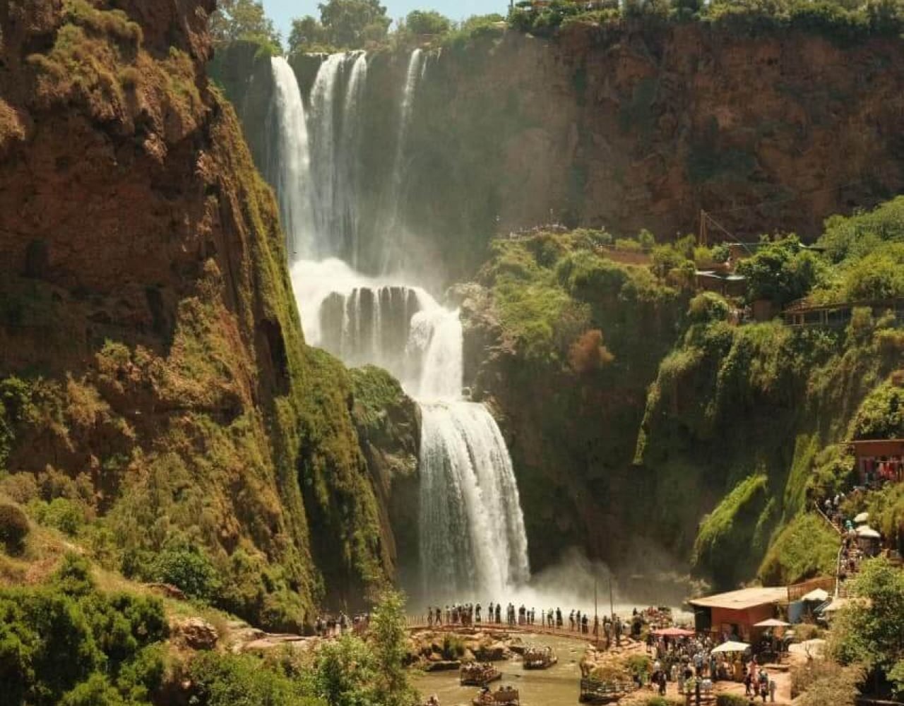 Aerial view of Ouzoud Waterfalls with pools and riverside restaurants