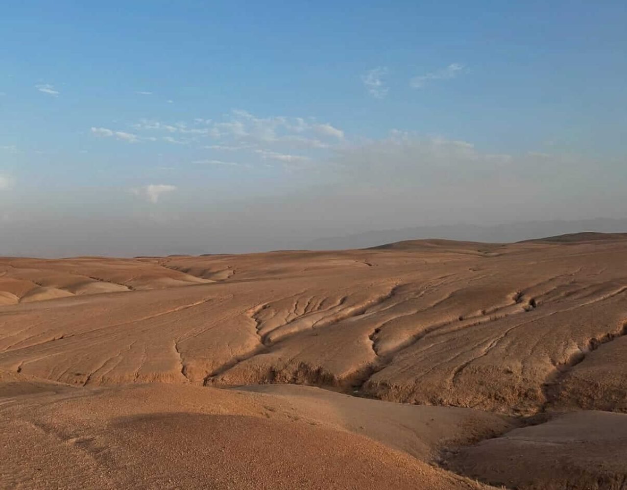 Rolling desert hills and landscape of Agafay near Marrakech Title: Agafay Desert Landscape