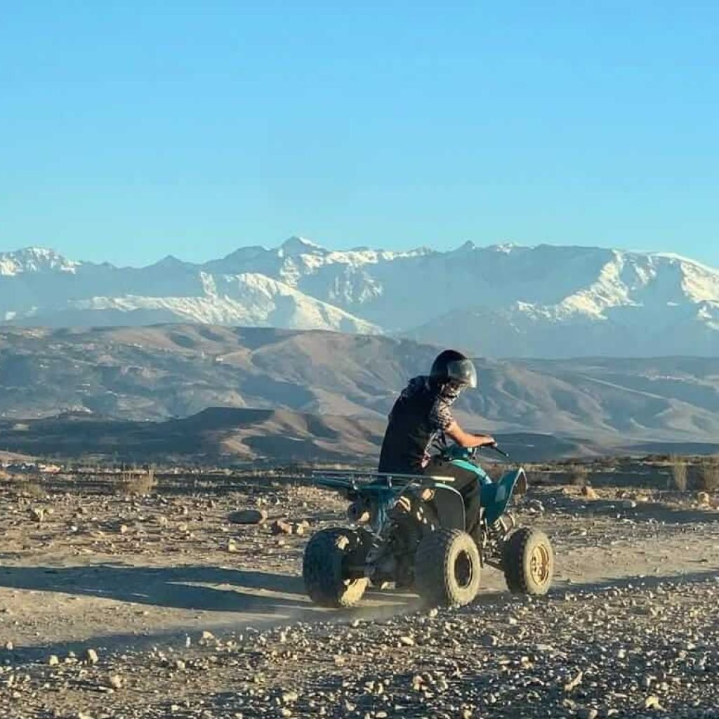 Quad biking in Agafay Desert with Atlas Mountains view