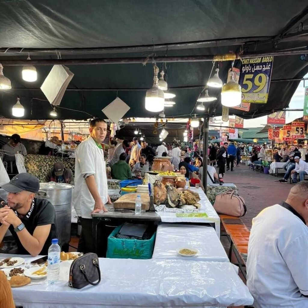 Local street food stall with grilled meats in Marrakech Jemaa el-Fnaa