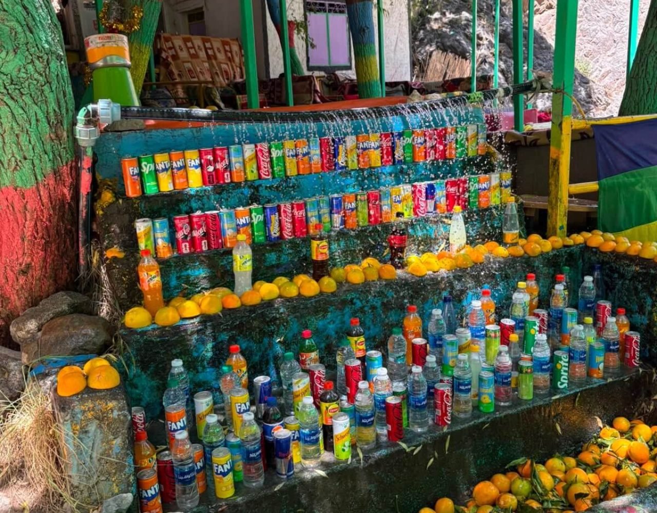 Traditional stall selling drinks and fruit on the road to Ourika